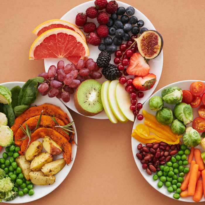3 plates of mixed fruits and vegetables